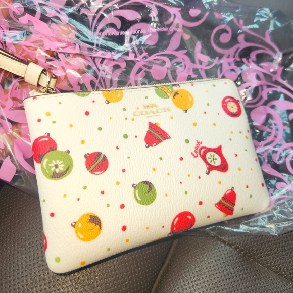 Coach Handbags - NWT Coach Holiday Print Wristlet